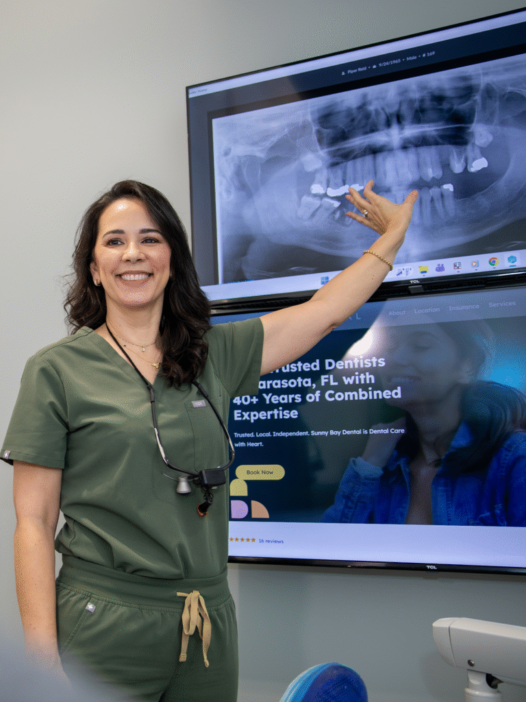 Dr. Anny Sa showing a xray