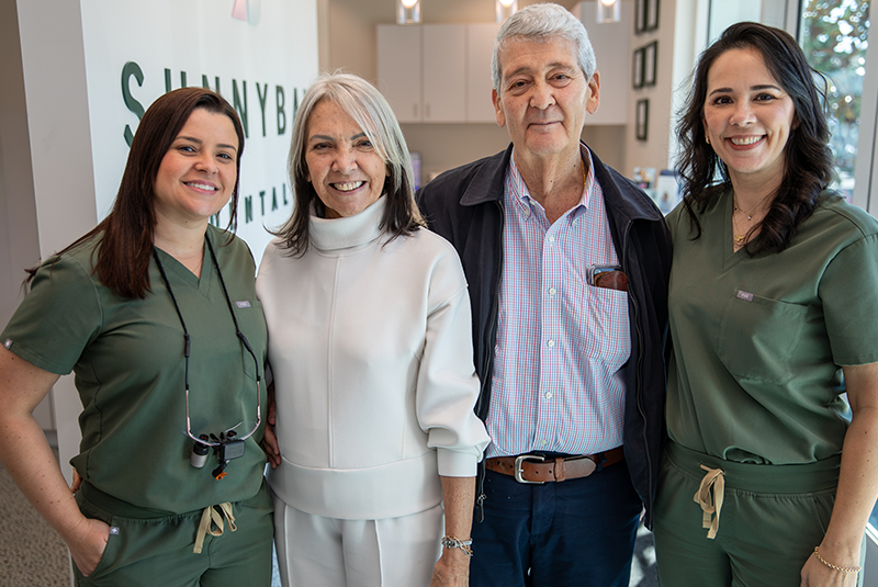 Both doctors with their patient and her spouse